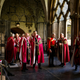 Sir Derek Oulton (L) sits alongside other Knights as they muster in the Abbey cloisters before the arrival of Britain's Queen Elizabeth for a Service of the Order of the Bath at Westminster Abbey in London May 9 , 2014. The service is held every four years and attended by the Prince of Wales, while the Queen attends every second service.